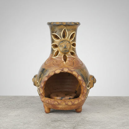 Hand-painted terracotta sun pot with gold accents in three garden colors