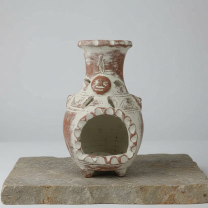 Hand-painted terracotta clay chimney candle holder with red and white three-legged vase design for garden