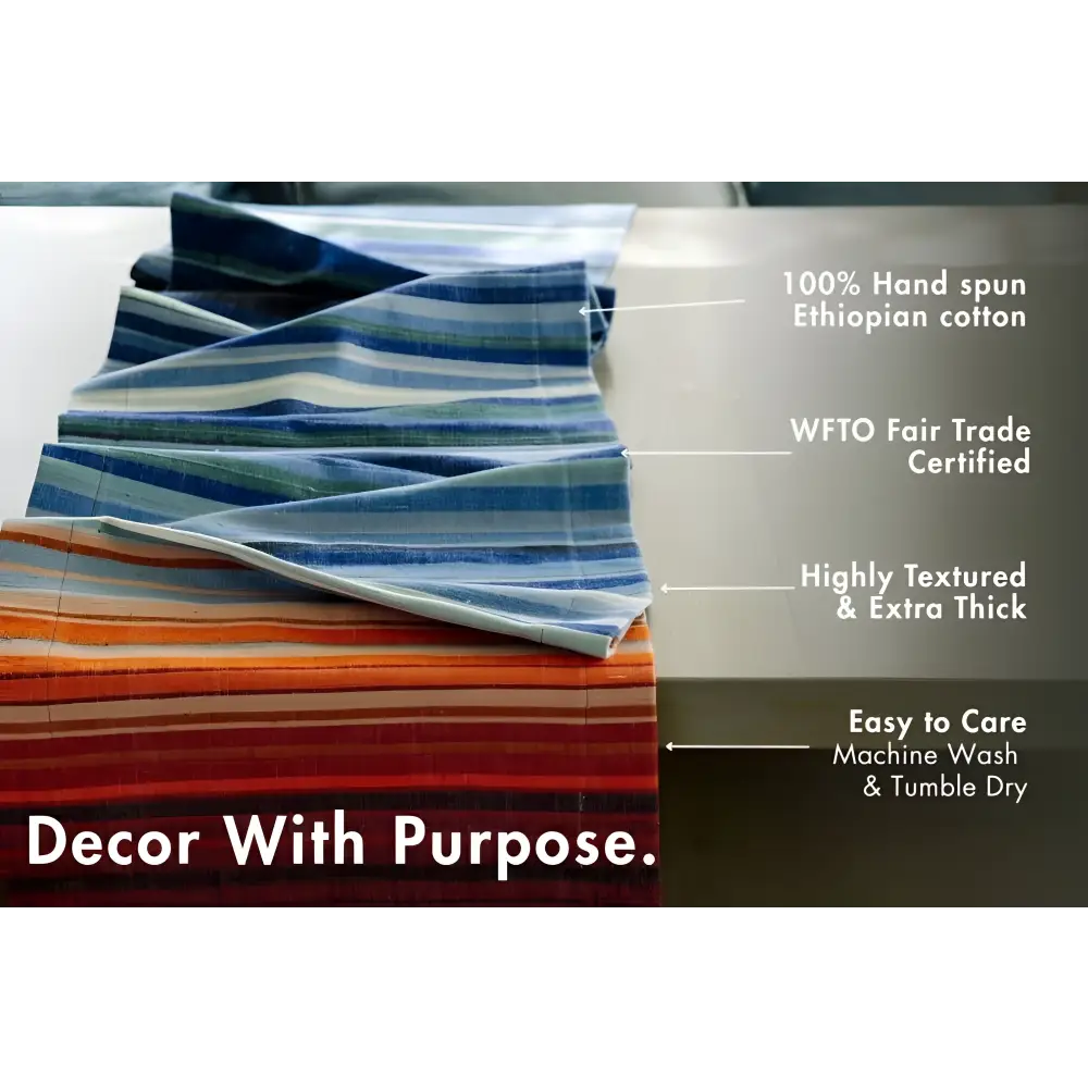 Blue and white striped handmade ethiopian cotton table runner with orange red stripes wfto fair trade climate warming