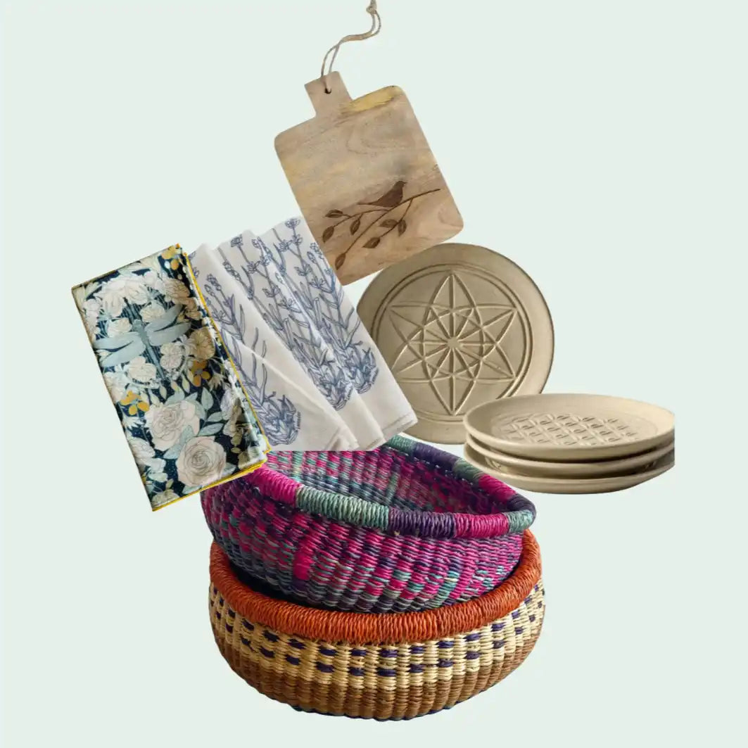 A collection of homeware items including woven baskets, decorative plates, a cutting board, and patterned towels.