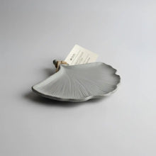 Delicate gray concrete gingko leaf dish with grooves and hanging loop