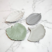 Handmade concrete leaf tray with four eco-friendly leaf-shaped trinket dishes in white, gray, and light green