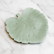 Handmade pale green monstera leaf ceramic tray with raised veins