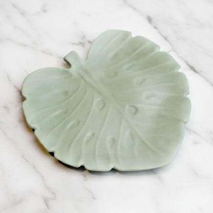 Handmade pale green monstera leaf ceramic tray with raised veins