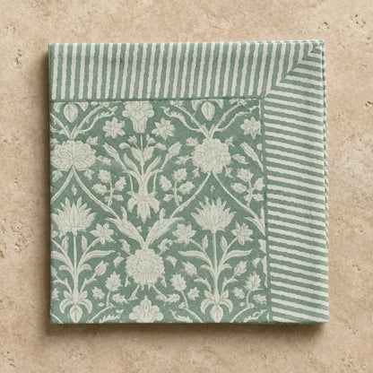 A set of 4 cotton block print napkins in sage green with white floral damask and striped borders for dining use