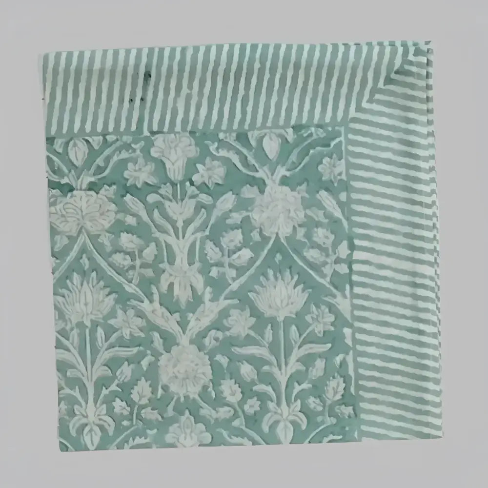 Cotton napkin with greenish gray colors in traditional block print design. 