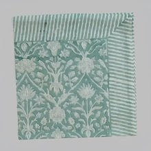 Cotton napkin with greenish gray colors in traditional block print design. 