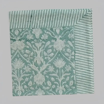 Cotton napkin with greenish gray colors in traditional block print design. 