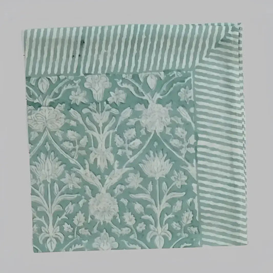 Cotton napkin with greenish gray colors in traditional block print design. 