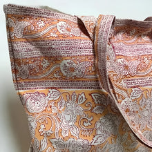 Hand block printing cotton canvas tote with Rashmi orange pattern and floral paisley design