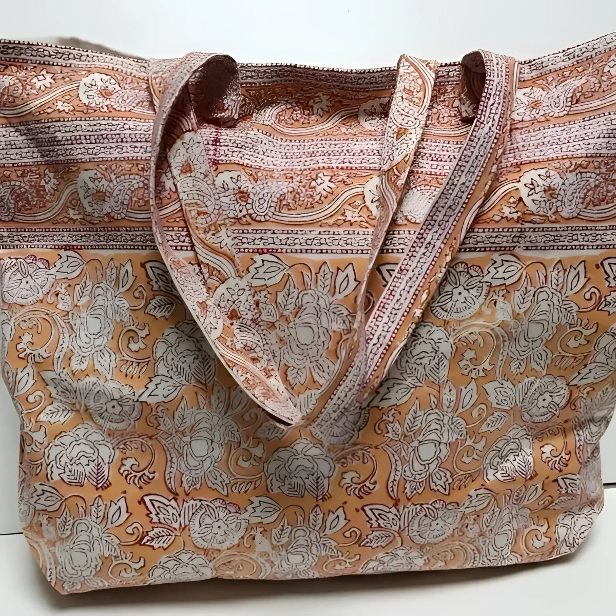 Hand block printing cotton canvas tote with rashmi orange pattern and floral stripe design