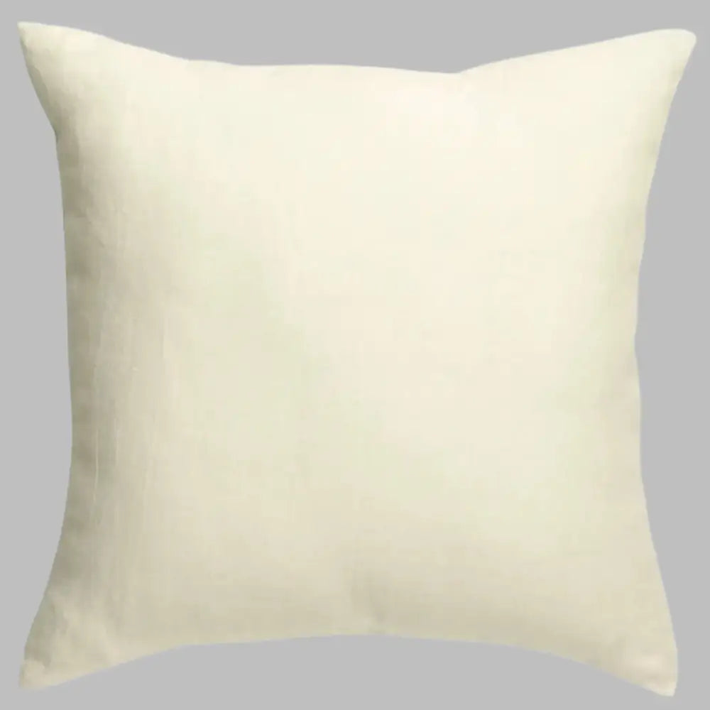 an off white pillow on a white background