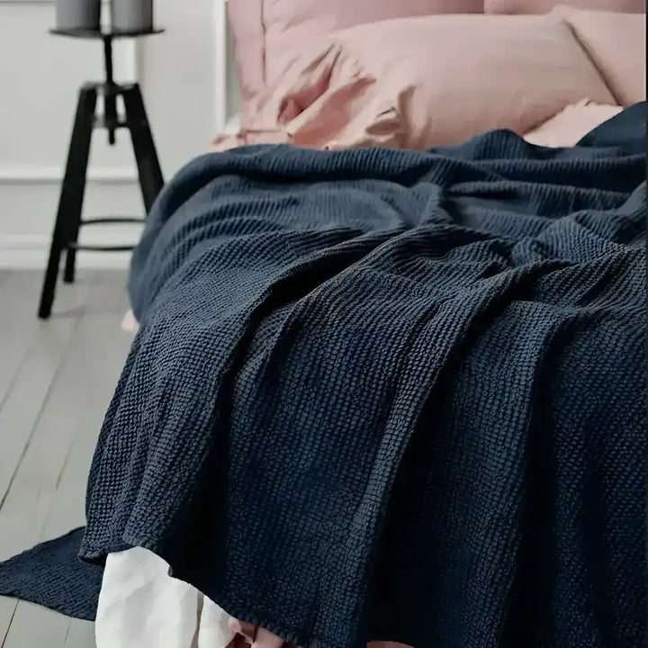 Dark gray waffle blanket in various colors