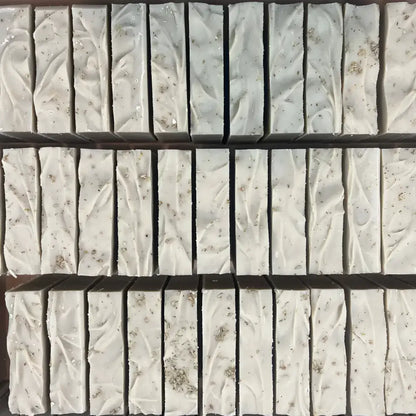 Desert sage soothing bar soap with white rectangular bars textured with dried lavender specks and certified organic essential oils