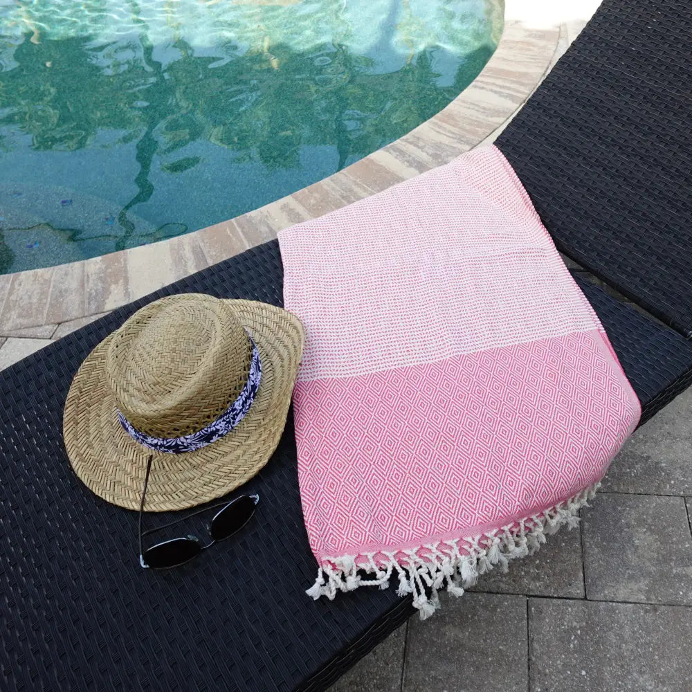 Turkish beach towel with diamond and dot woven design.