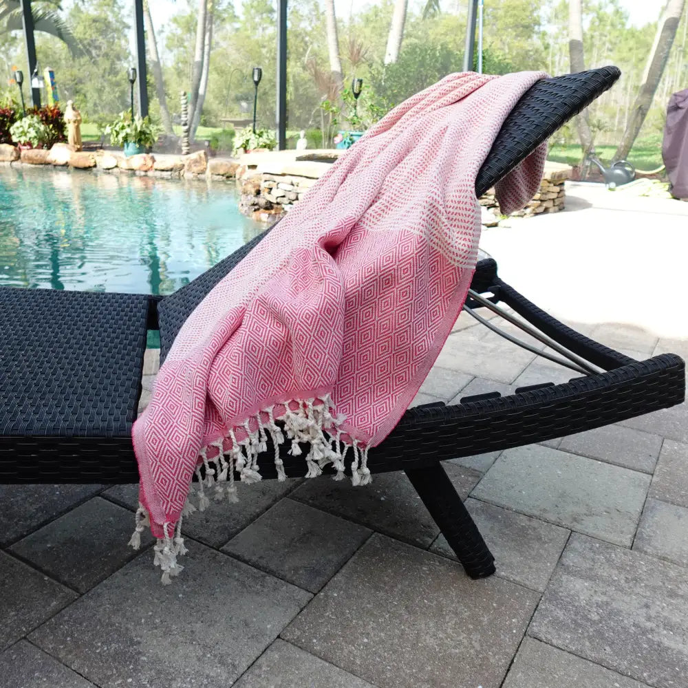 Turkish beach towel with diamond and dot woven design.