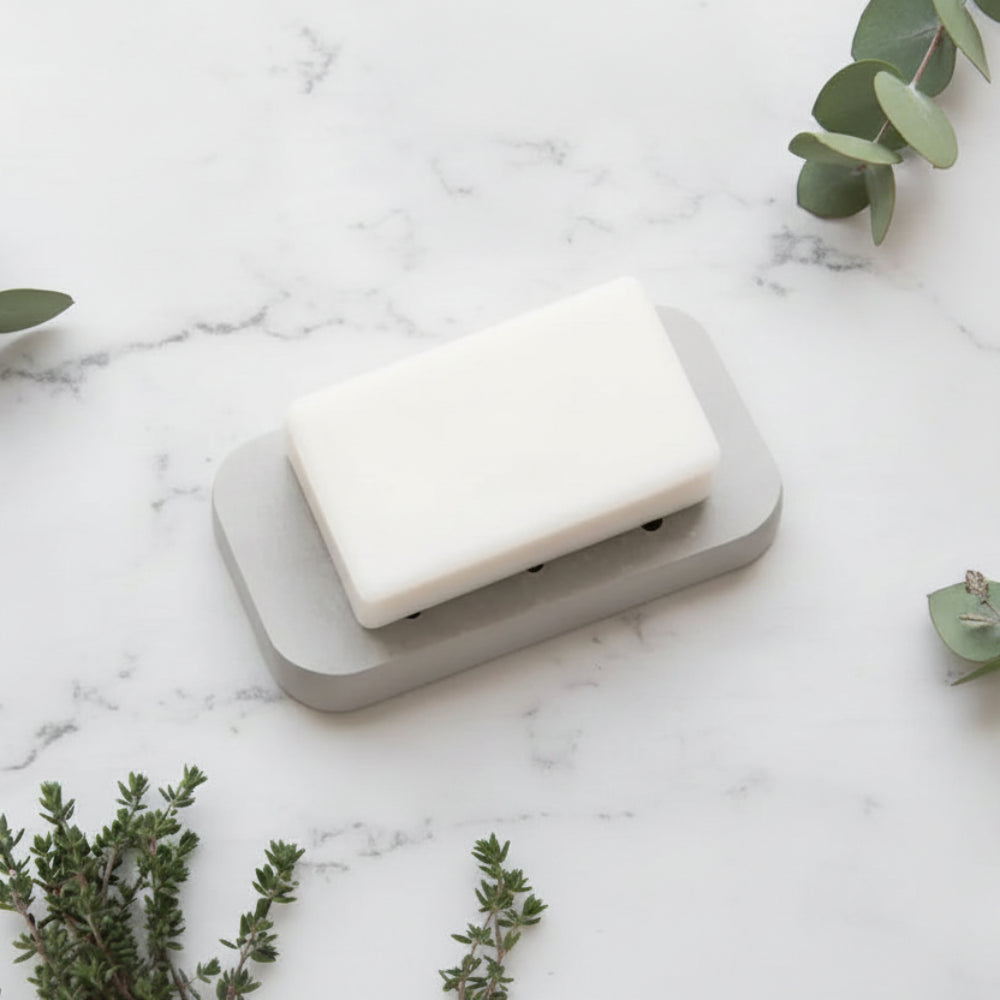 Eco-friendly handmade diatomite soap dish with white soap and pink flowers