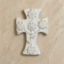 Distressed white daisy wall clay cross with embossed floral and leaf patterns handmade in mexico for wall decor