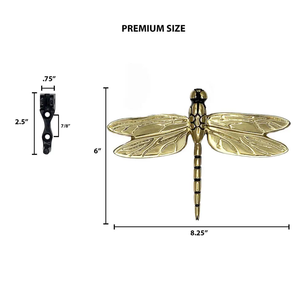 Gold dragonfly decorative item with measurements on a white background