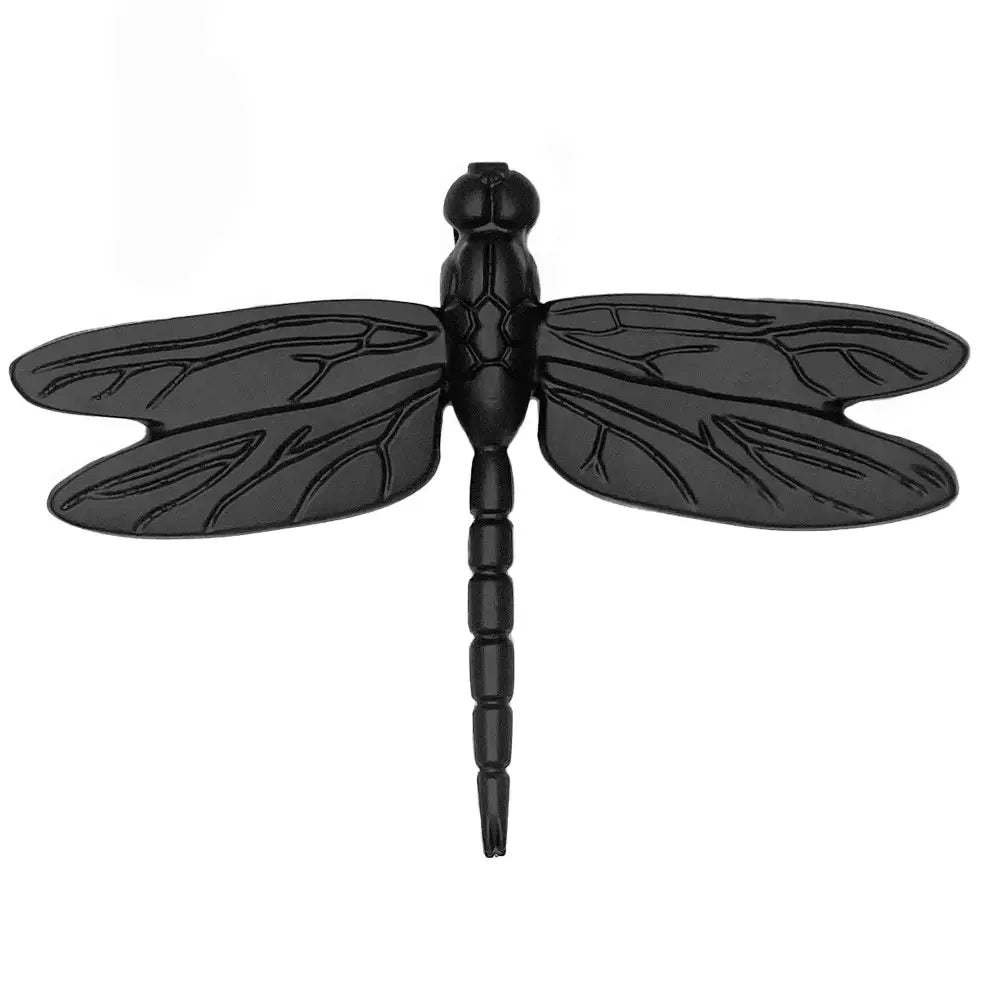 Black dragonfly-shaped object on a white background