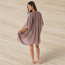 A lightweight driftwood tribal kimono cover up in taupe with subtle stripes and a relaxed draped silhouette