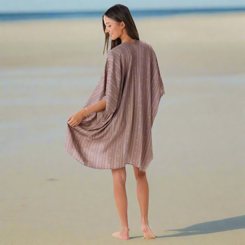 Woman in lightweight Driftwood Tribal Kimono Cover Up on the beach