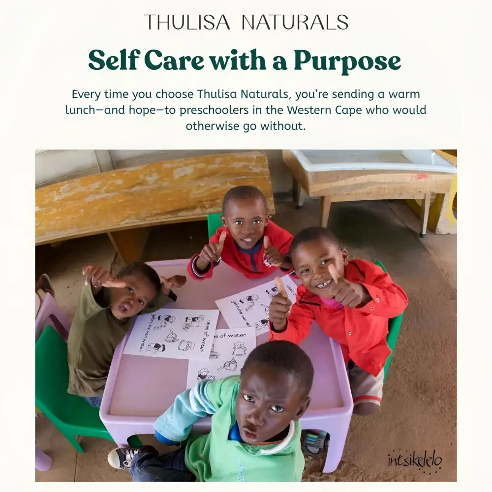 Green kids plastic chair with white cushion and grapefruit shower steamers gift set