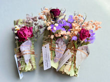 Handmade eucalyptus and amethyst smudge stick with red purple flowers