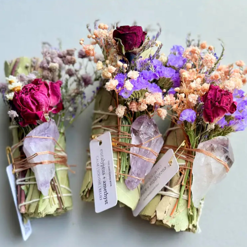 Handmade eucalyptus and amethyst smudge stick with red purple flowers