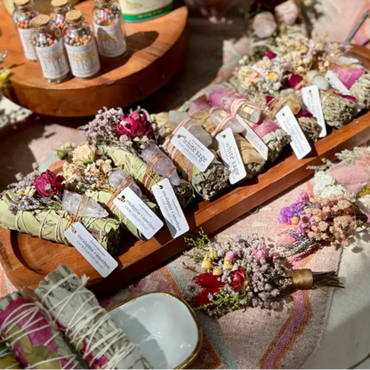 Handmade eucalyptus and amethyst wand on wooden tray