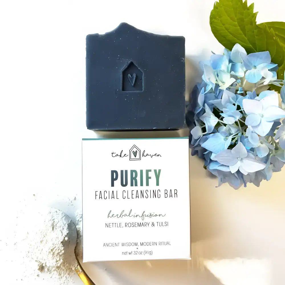 Dark blue rectangular facial cleansing bar with heart in house design perfect for excess oil and western herbalism care