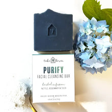 Dark blue rectangular facial cleansing bar with heart in house design perfect for excess oil and western herbalism care