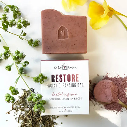 Facial cleansing bar restore with pinkish brown rose kaolin clay and embossed heart design for western herbalism care