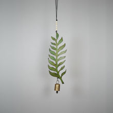 Handmade green recycled metal fern leaf wind chime with genuine bell