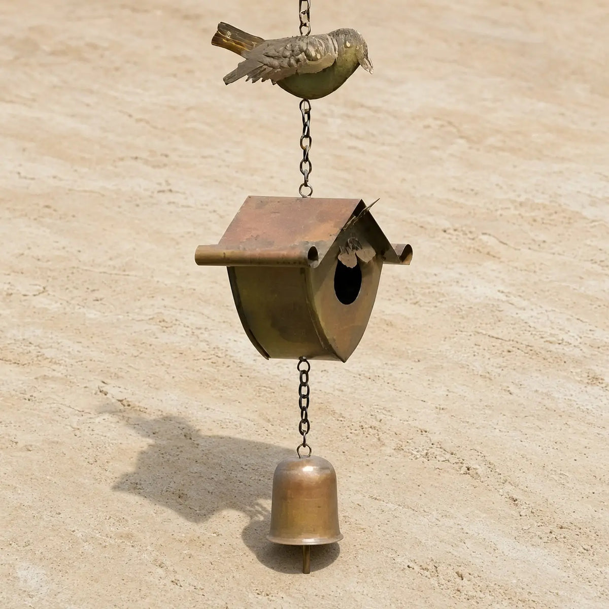 Flamed metal birdhouse wind chime with brass finish small bell and chain links unique metal decor piece