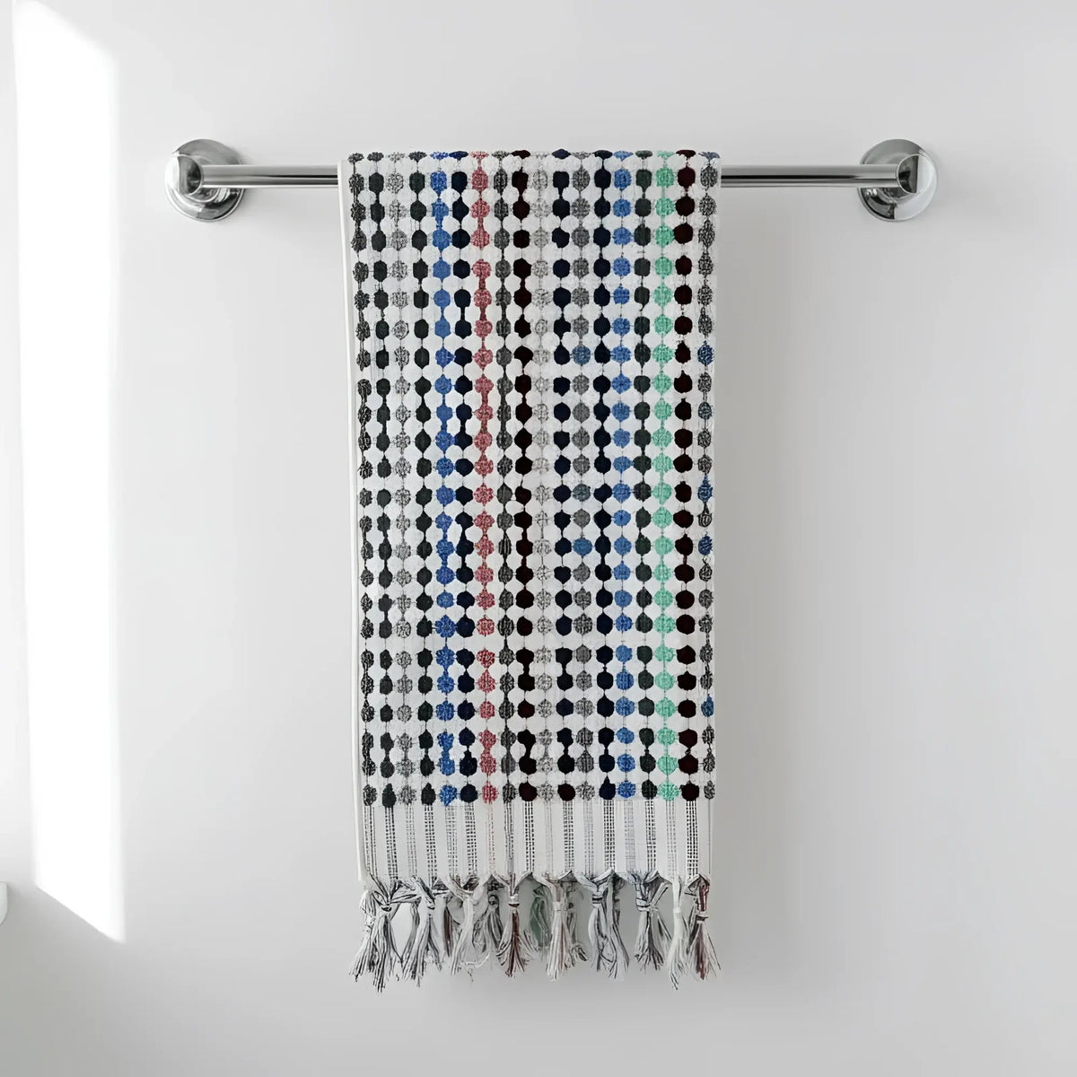 Flamingo dotted turkish towel with colorful geometric dots in blue black gray pink and tasseled fringe edges