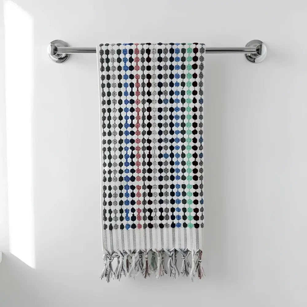 Flamingo dotted turkish towel with colorful geometric dots in blue black gray pink and tasseled fringe edges