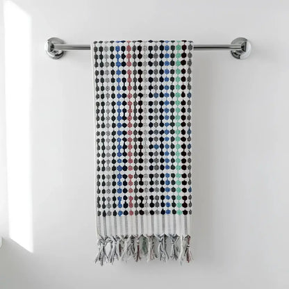 Flamingo dotted turkish towel with colorful geometric dots in blue black gray pink and tasseled fringe edges