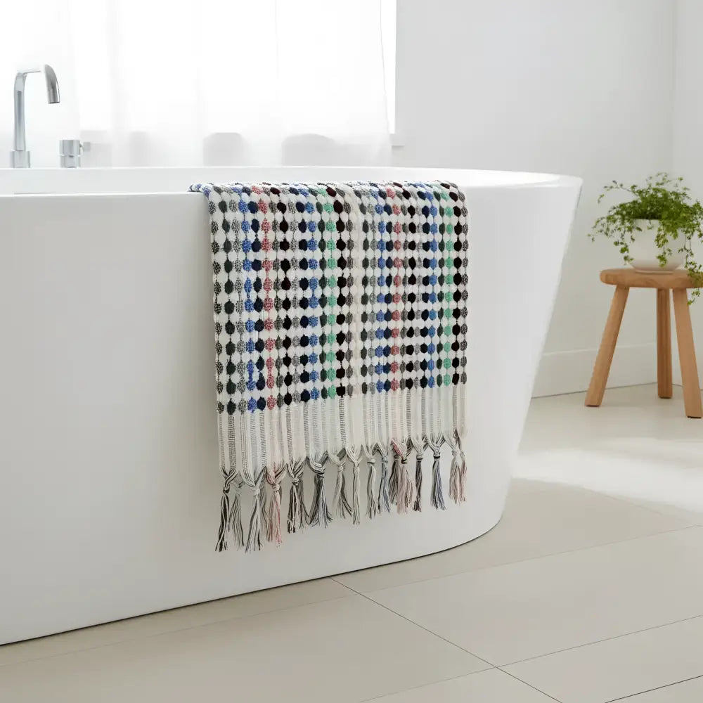 Flamingo dotted turkish towel with multicolored geometric dots and tassled fringe perfect as a turkish bath towel