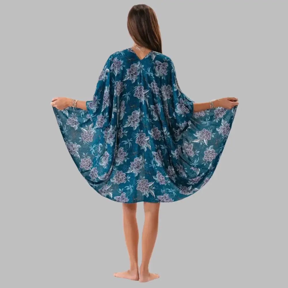 Blue and purple kimono cover up with a floral design.