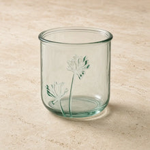 Clear glass classico flora tumbler with delicate raised dandelion designs made from recycled glass for nature-inspired elegance