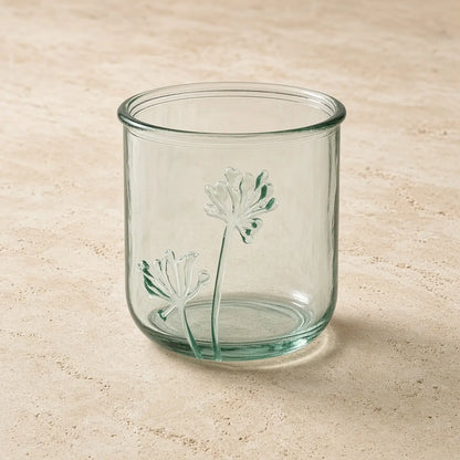 Clear glass classico flora tumbler with delicate raised dandelion designs made from recycled glass for nature-inspired elegance