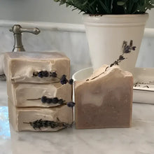  French Lavender shea butter bar soap, features a soothing lavender aroma complemented by bergamot, lemon, and eucalyptus top notes. The artisanal production process ensures each bar has distinctive color variations and unique swirl patterns.