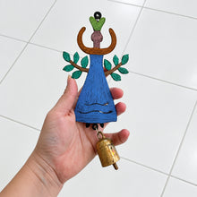 Hand-painted wooden bell garden angel in blue dress with green leafy arms and brown horns wind chime angel