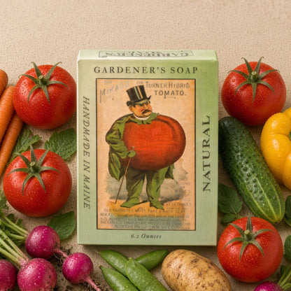 Light green gardener’s soap box with vintage seed packet design featuring tomato man and french green clay premium ingredients