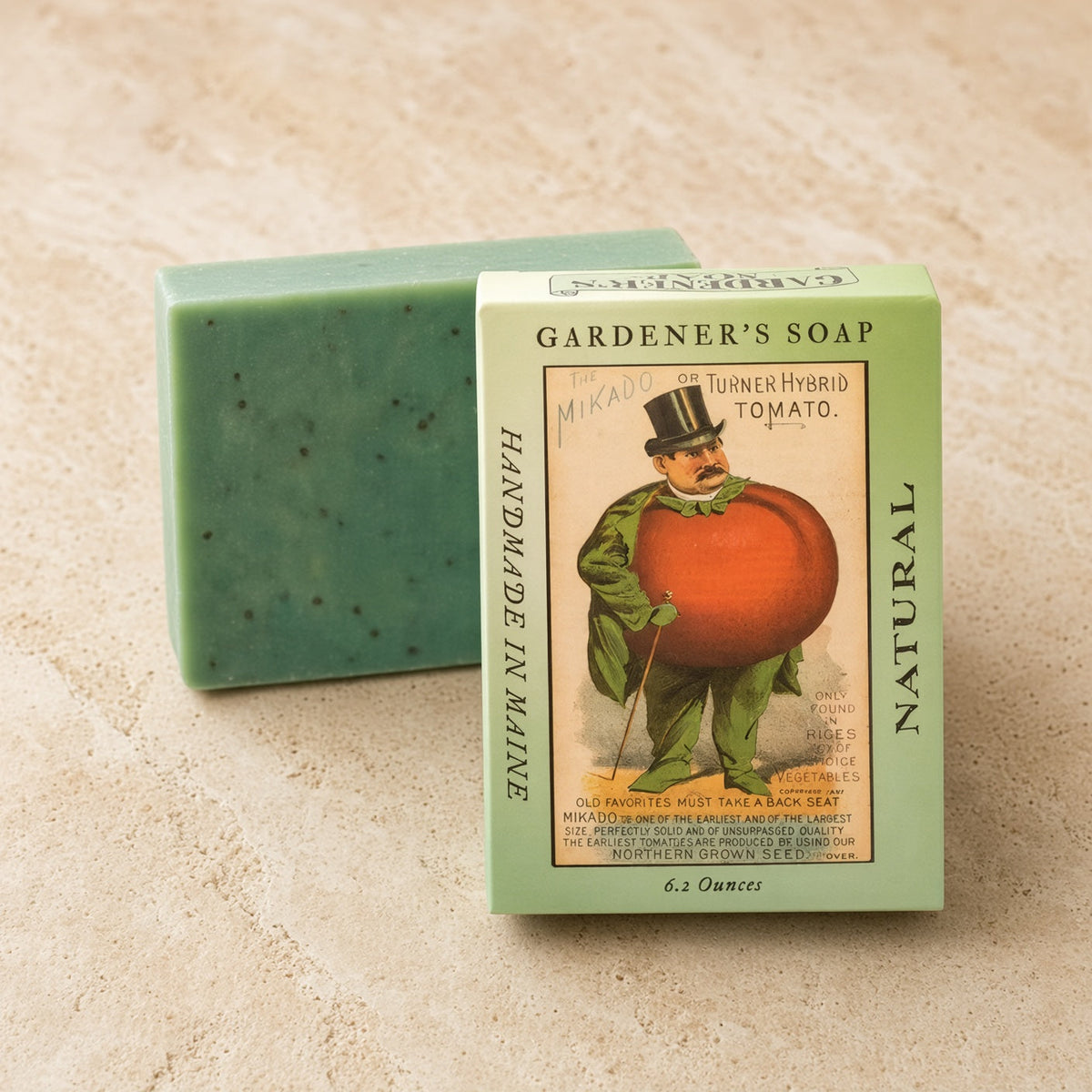 Handmade eco-friendly green soap bar in a light green vintage seed packet box with tomato man illustration