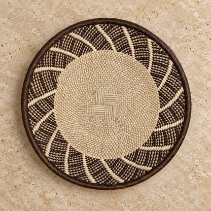 Genuine binga wall basket 12 inch handwoven african basket with dark brown rim and beige geometric patterns