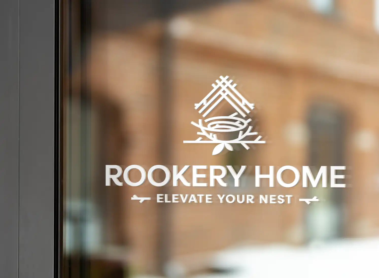Glass door with ’Rookery Home’ logo.