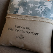 Handmade eco-friendly reading pillow with blue zinnia floral pattern and go big or go home book quote