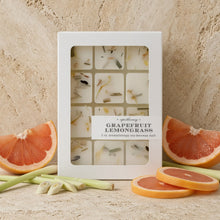 White box of nine grapefruit lemongrass soy-beeswax blend melts with dried botanicals and phthalate-free fragrance label